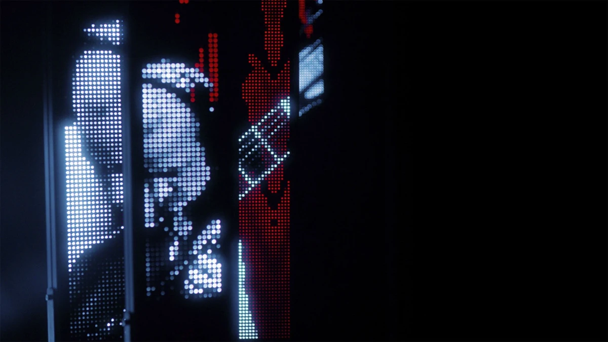 Marc Sinan displayed over multiple LED panels as he is playig his guitar